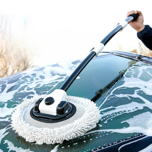 ReachMop washing a car windshield with foam
